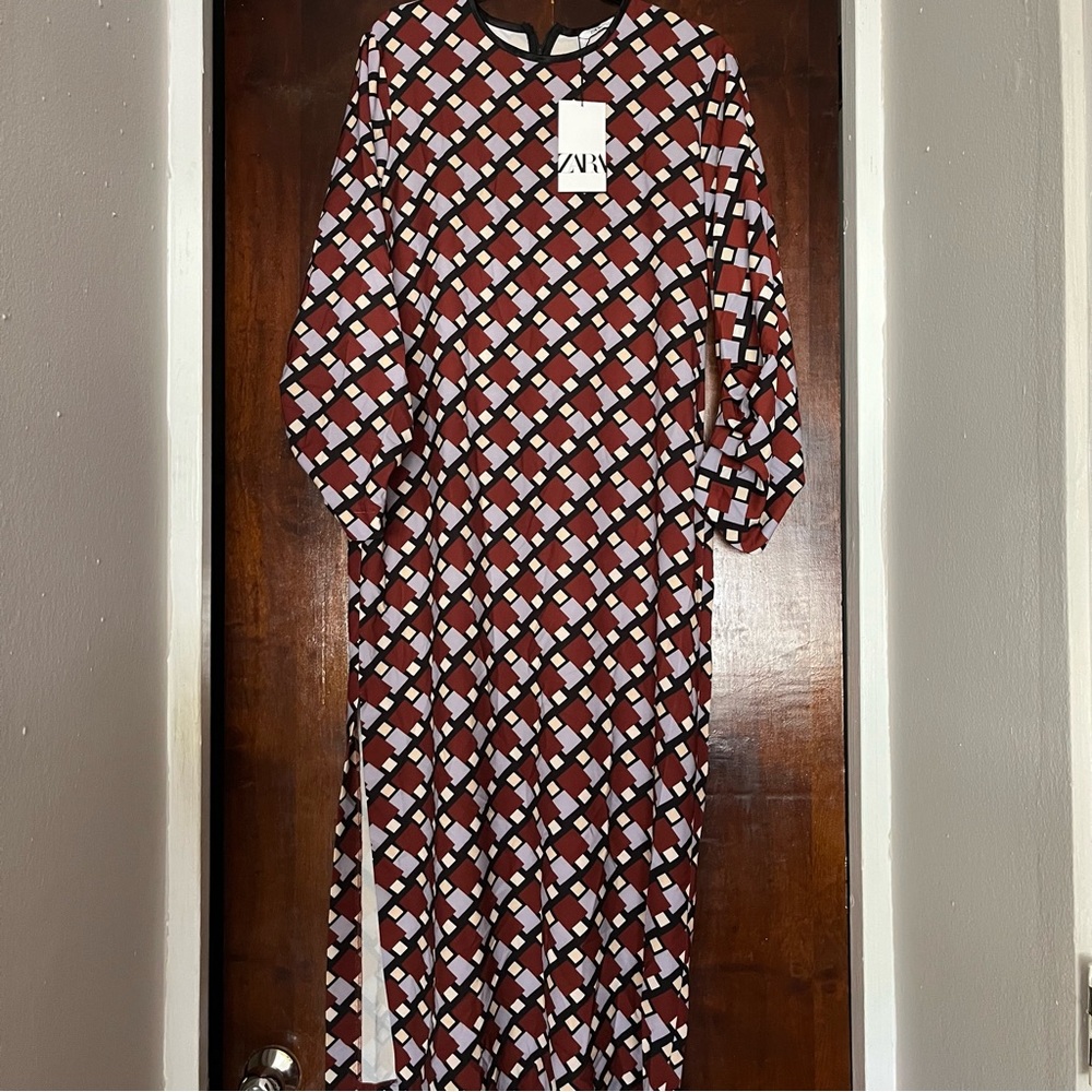 Beautiful Midi Dress from Zara. Relaxed fit. Never used, with store tag.